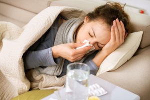 subbotina121100071.jpg - sick woman  flu  woman caught cold  sneezing into tissue