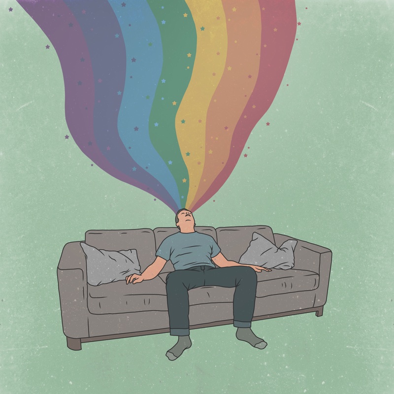 ソファーに座っている男性に虹色が吸い込まれている