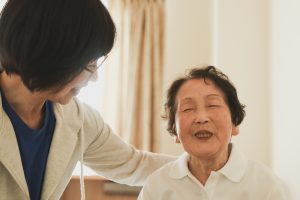 Japanese woman is taking care of her mother at home