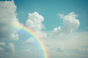 Cloudscape rainbow of natural sky with blue sky and white clouds and colorful rainbow in the sky use for wallpaper background, Process in vintage style (Cloudscape rainbow of natural sky with blue sky and white clouds and colorful rainbow in the sky u
