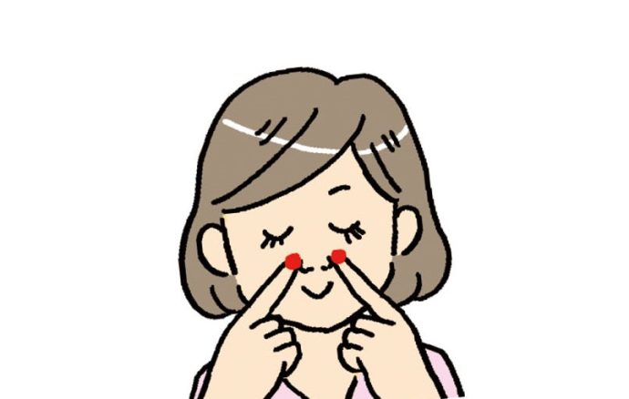 鼻のツボを押す女性のイラスト