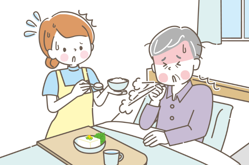 むせる男性